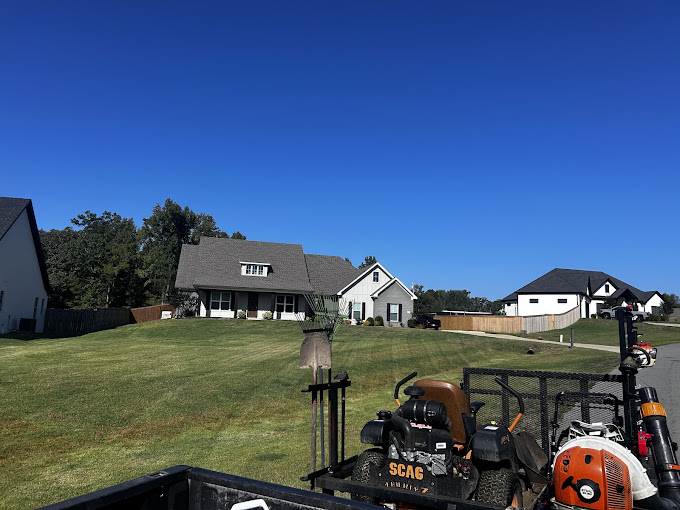 A utility truck parked in front of a house